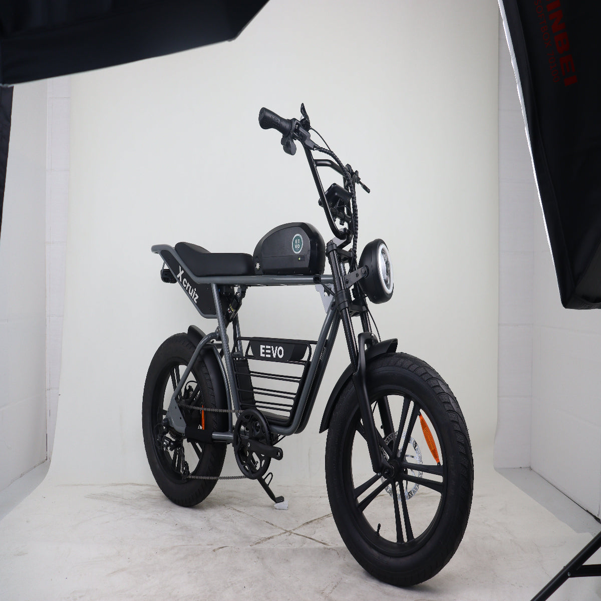 Black electric bike with 'EEVO' branding on a white background